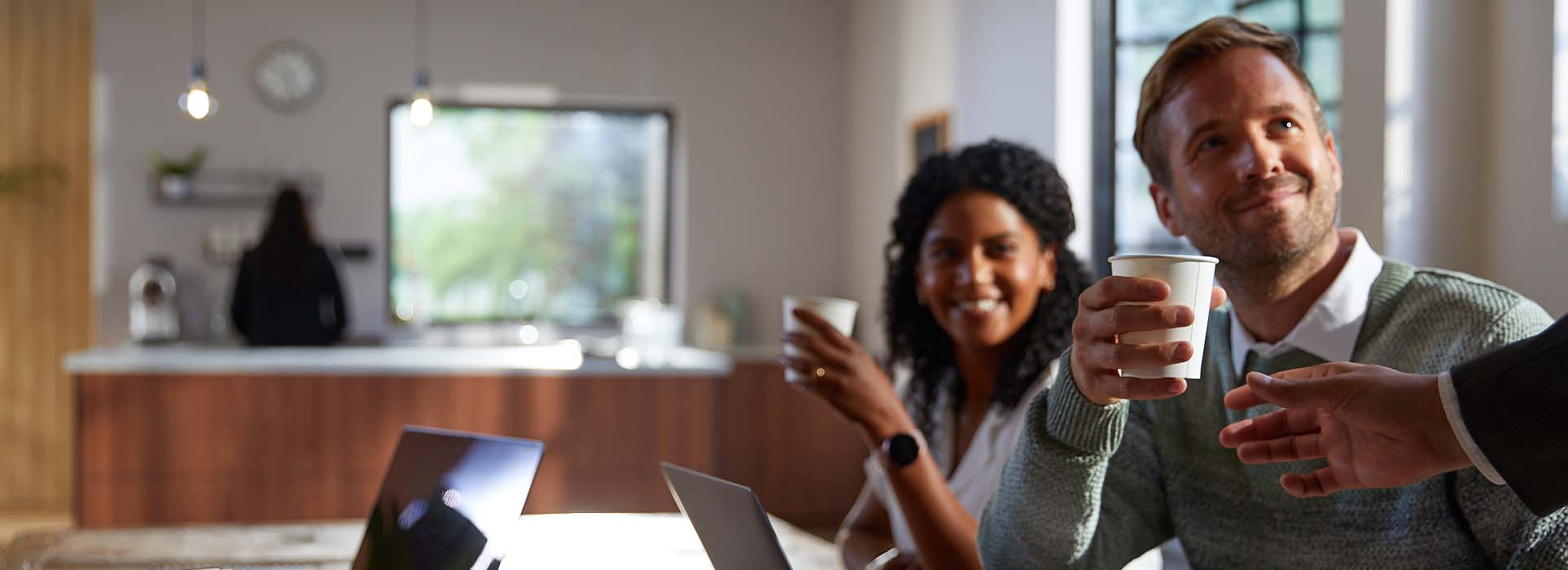 colleagues drink coffee